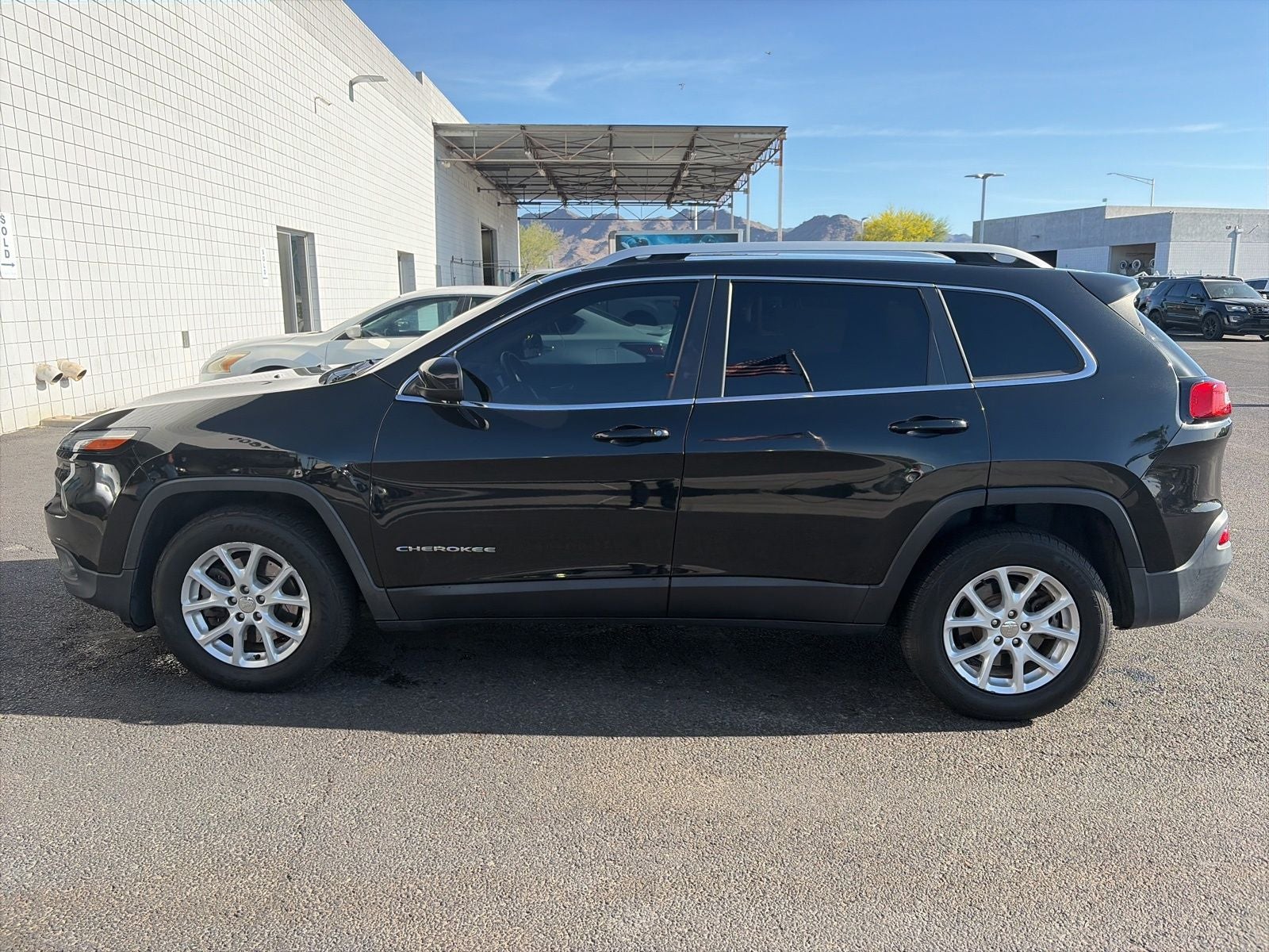 Used 2015 Jeep Cherokee Latitude with VIN 1C4PJMCB0FW653269 for sale in Buckeye, AZ