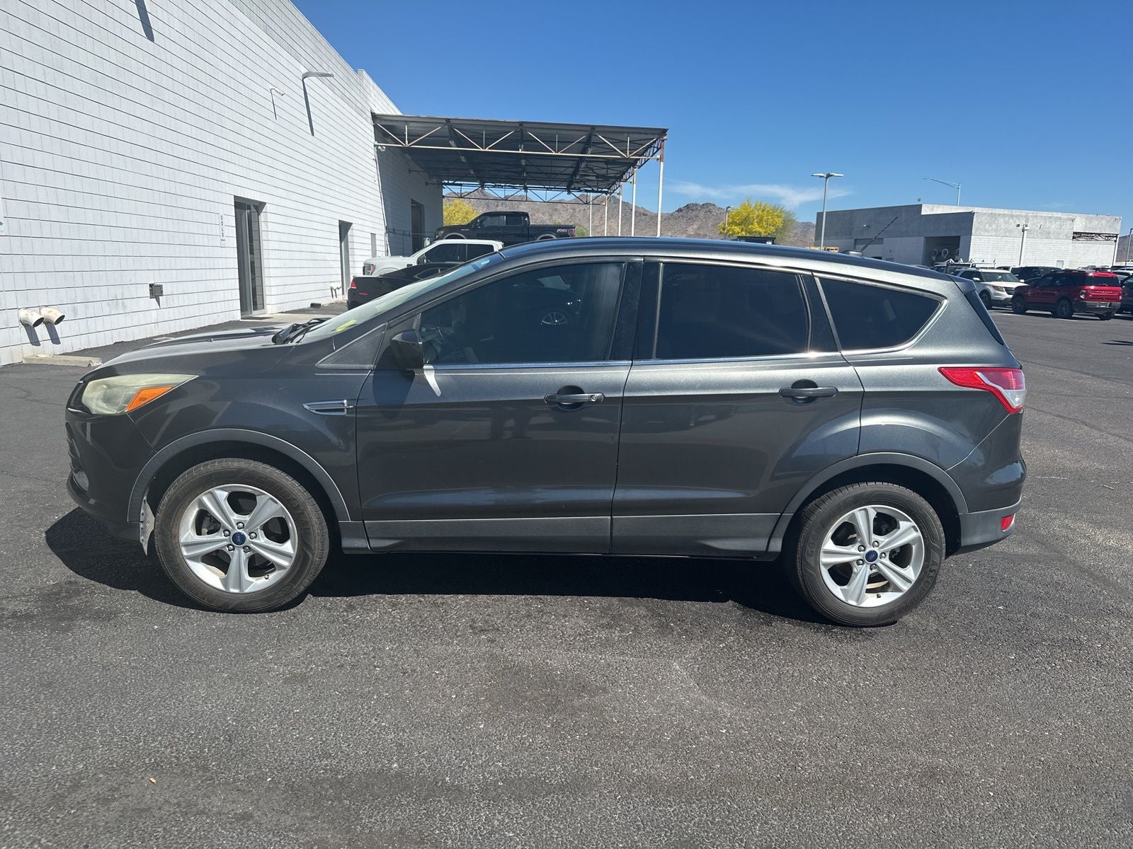 Used 2016 Ford Escape SE with VIN 1FMCU0G71GUB84576 for sale in Buckeye, AZ