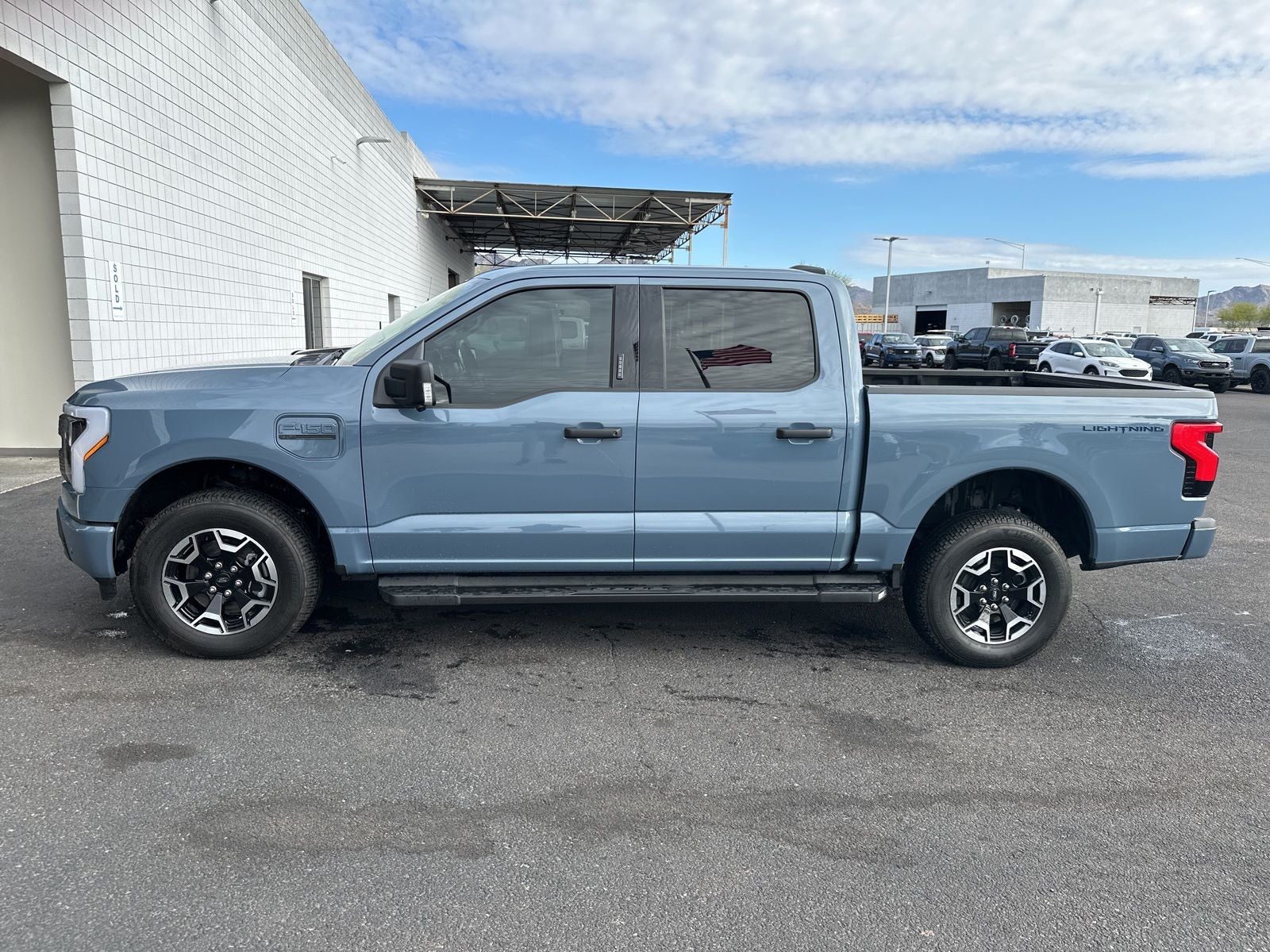 Used 2023 Ford F-150 Lightning XLT with VIN 1FTVW1EL9PWG50577 for sale in Buckeye, AZ