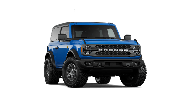2026 Ford Bronco Badlands in Velocity Blue Metallic, front three-quarter passenger side studio view.